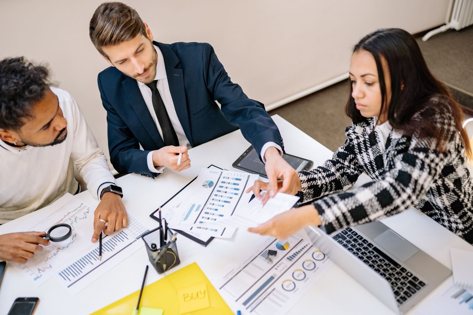 Team collaborating on marketing strategy in an office setting