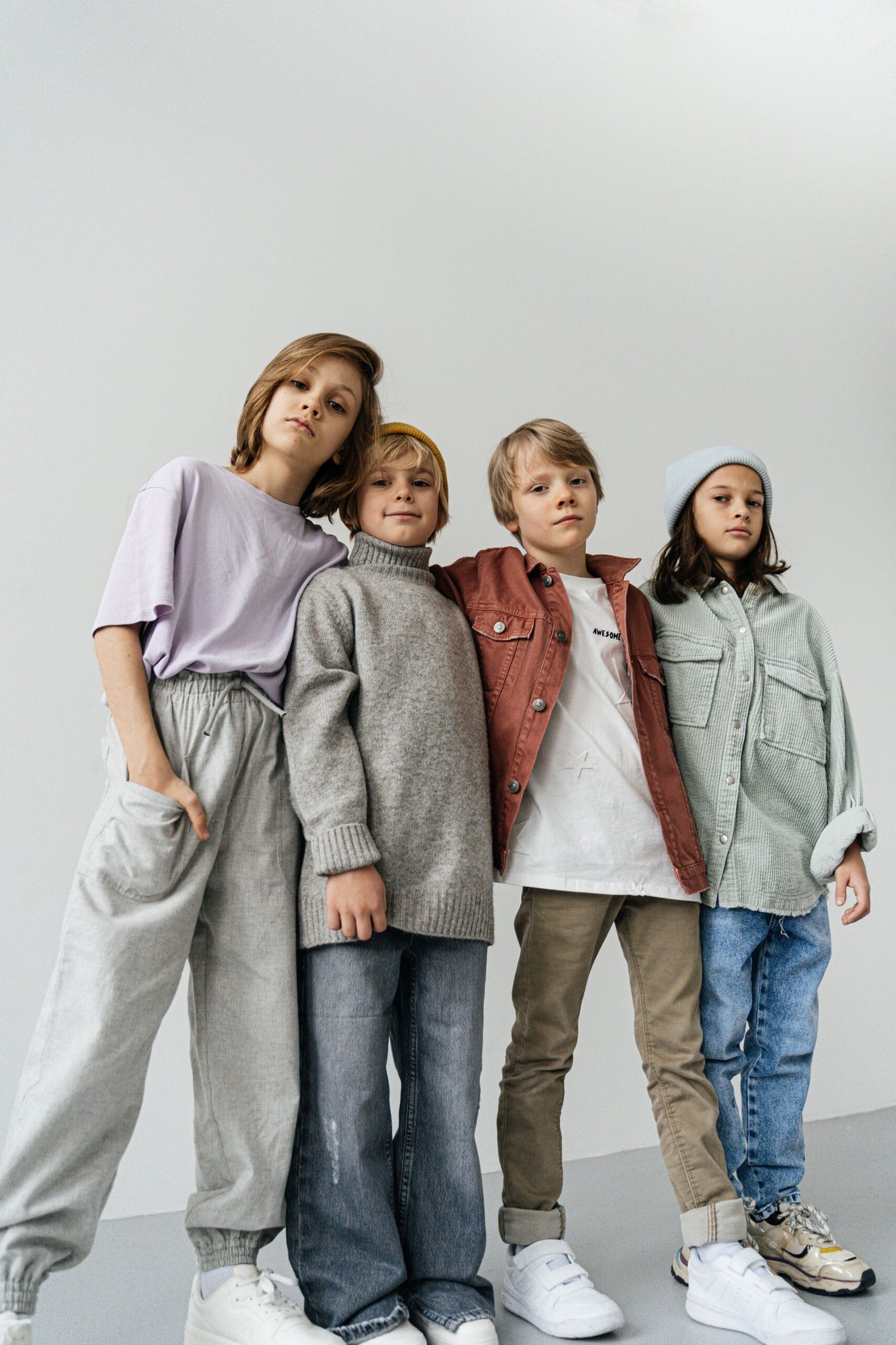 Children in stylish coordinated fashion attire