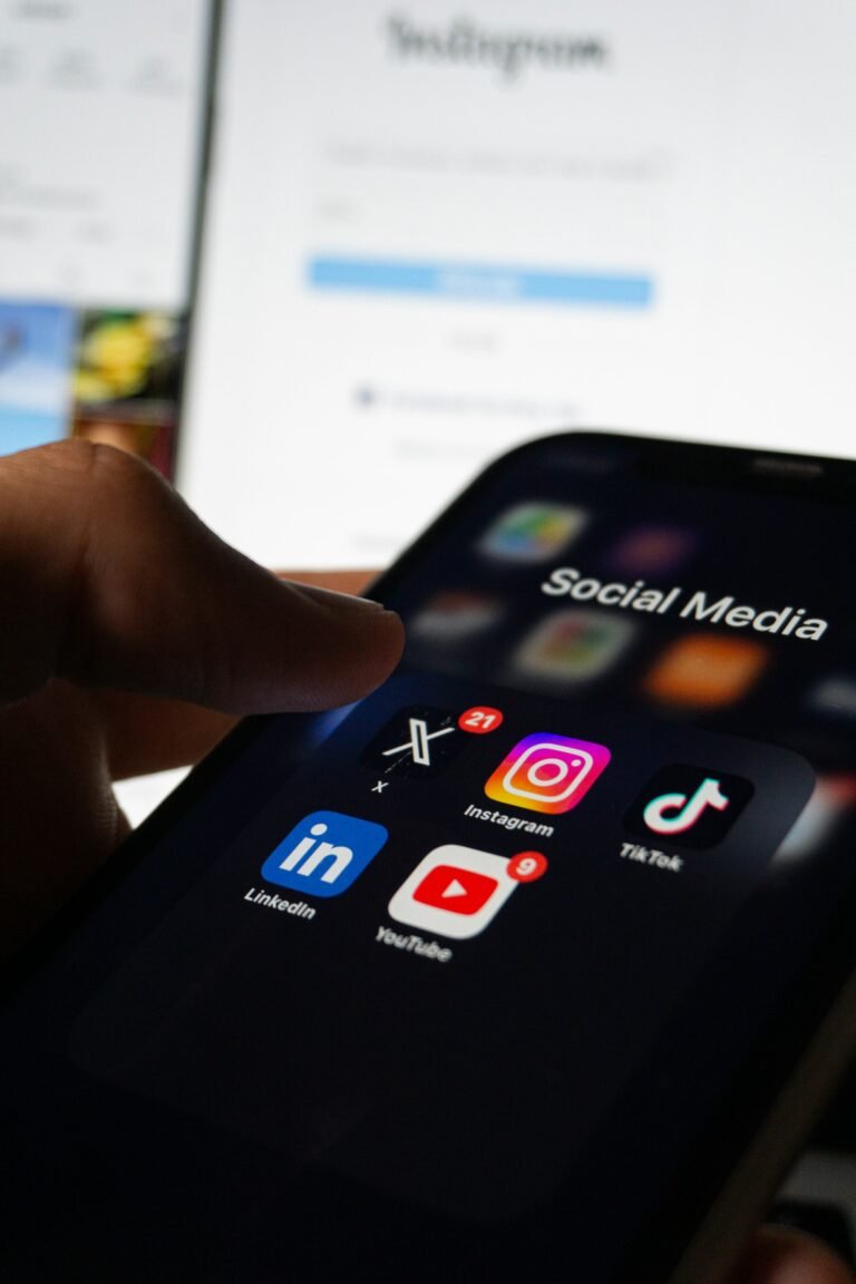 Smartphone displaying social media apps used for running Meta Ads campaigns