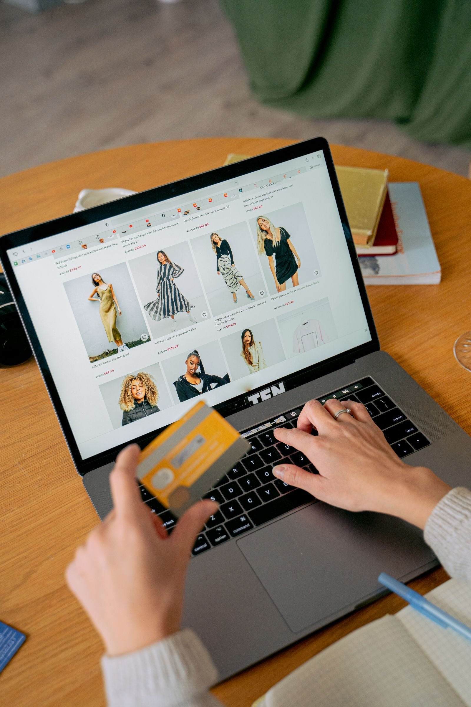 Woman making an online purchase on a laptop, representing an e-commerce store
