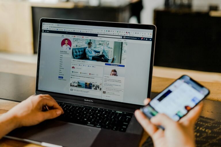 Marketer managing social media accounts across multiple devices