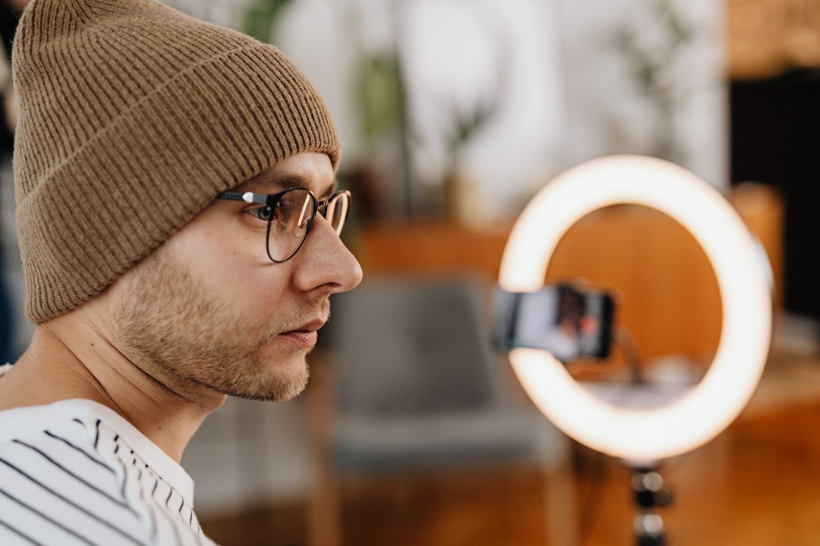 Content creator filming short-form video with a smartphone rig
