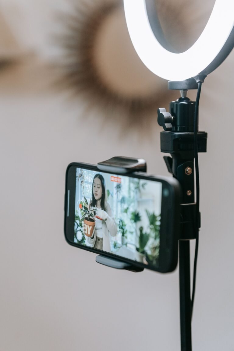 Cellphone and ring light on a stand for producing short-form video ads